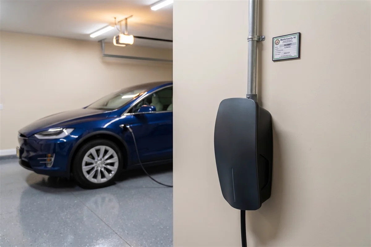 QMerit certified electrician installing Level 2 EV charger in Morris County NJ residential garage